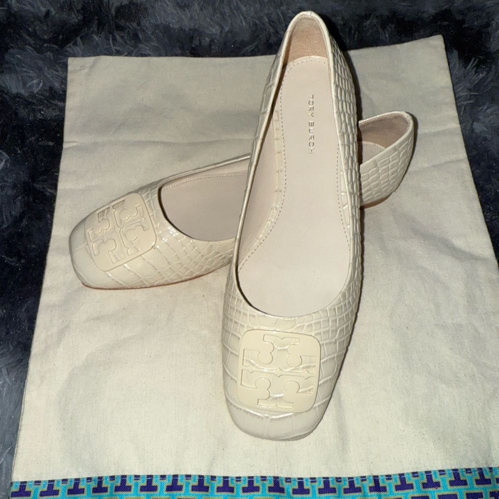 Tory Burch Cream Quilted Flats a dark spot at the the bottom